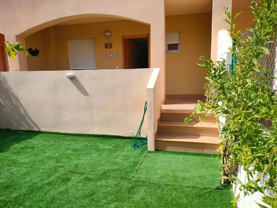 Bajo Con Jardin A Pie De Playa Y Piscina Comunitaria Con Jacuzzi Appartement Playas de Vera Buitenkant foto