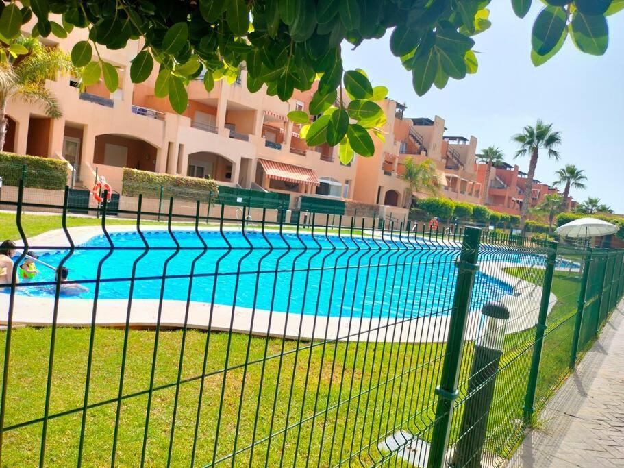 Bajo Con Jardin A Pie De Playa Y Piscina Comunitaria Con Jacuzzi Appartement Playas de Vera Buitenkant foto